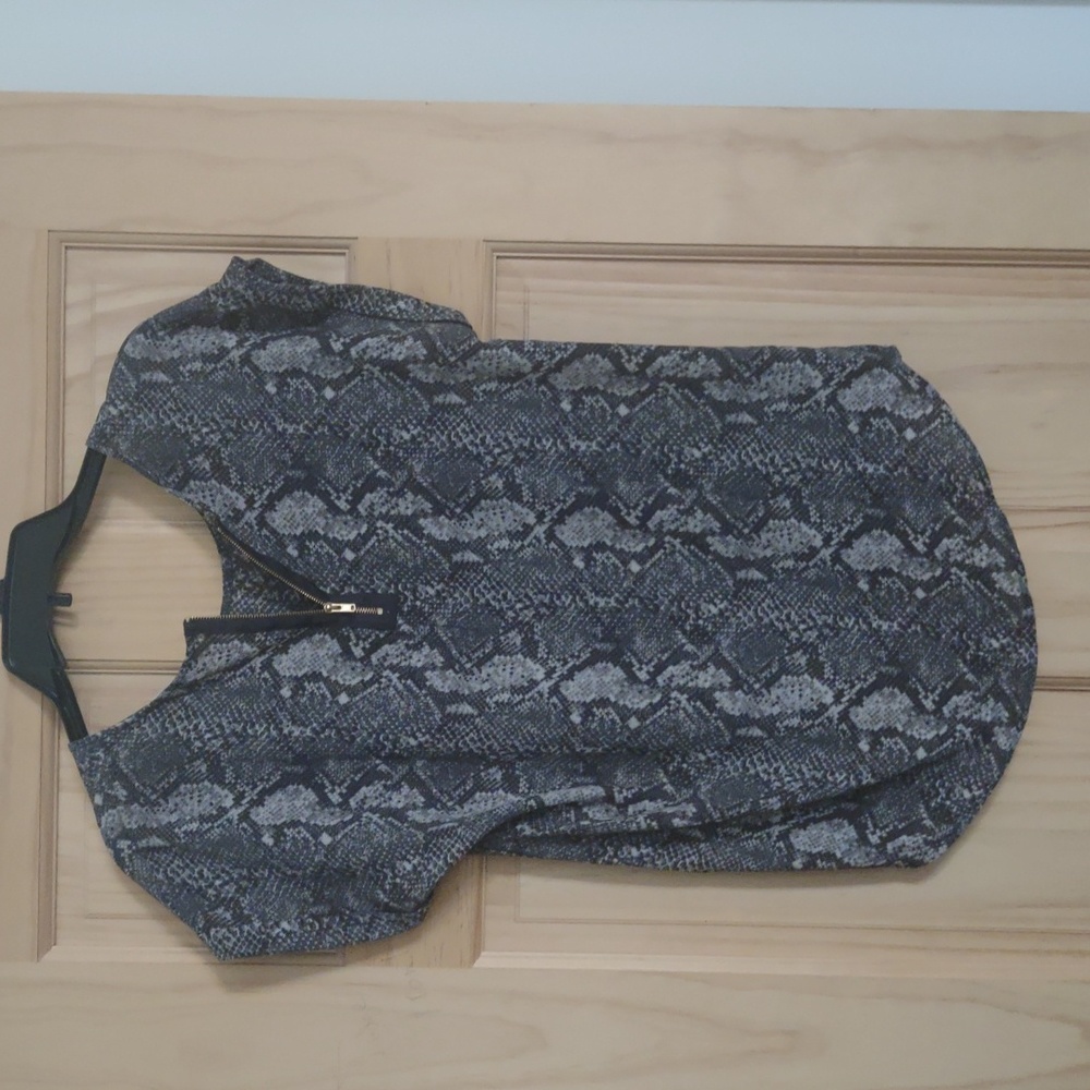 Snake print (gray and black) blouse; part zipper in back; worn 2 times